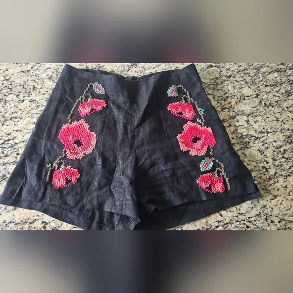 La Troupe black linen-style shorts featuring embroidered pink poppy Flowers - Picture 6 of 7